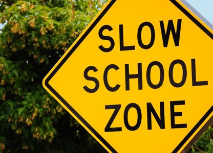 Yellow slow sign 