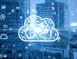 Cloud computing icon with digital data symbols connected across city skyscrapers, representing cloud technology and data networking