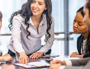 A corporate setting with colleagues in a meeting