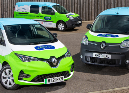 Three branded Renault vehicles in a car park