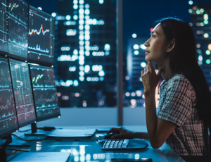 A person in an office using technology