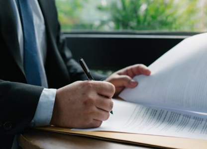 A person signing a contract
