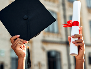 A graduation cap and scroll