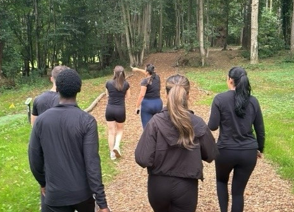 Procurement services team outside volunteering