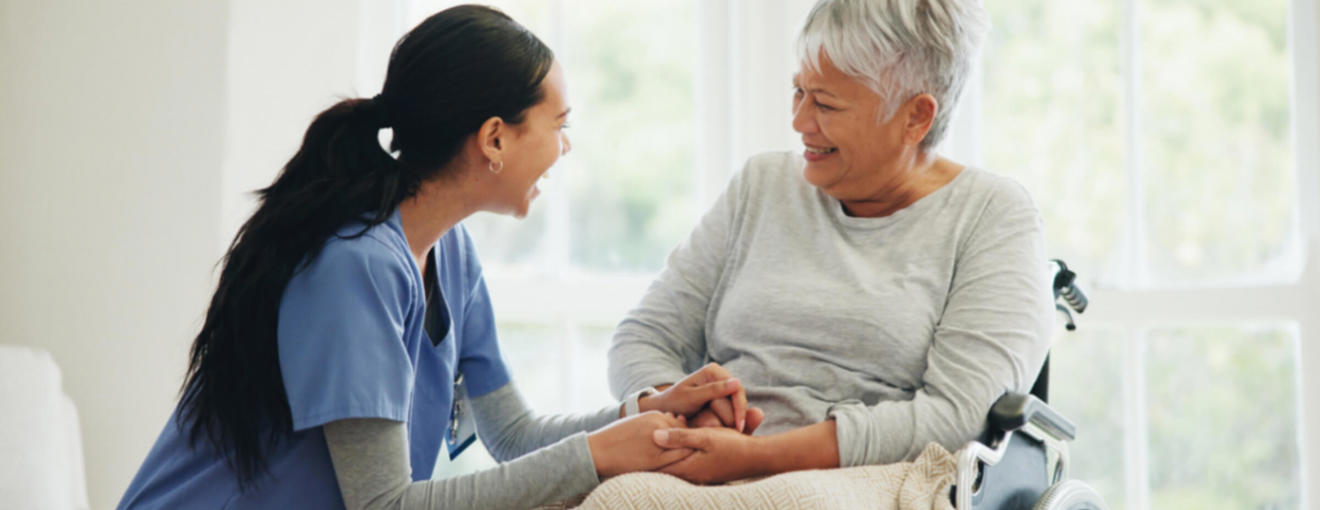 A health care worker supporting a patient