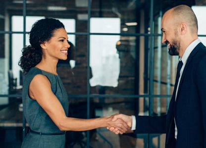 Handshake in a corporate setting