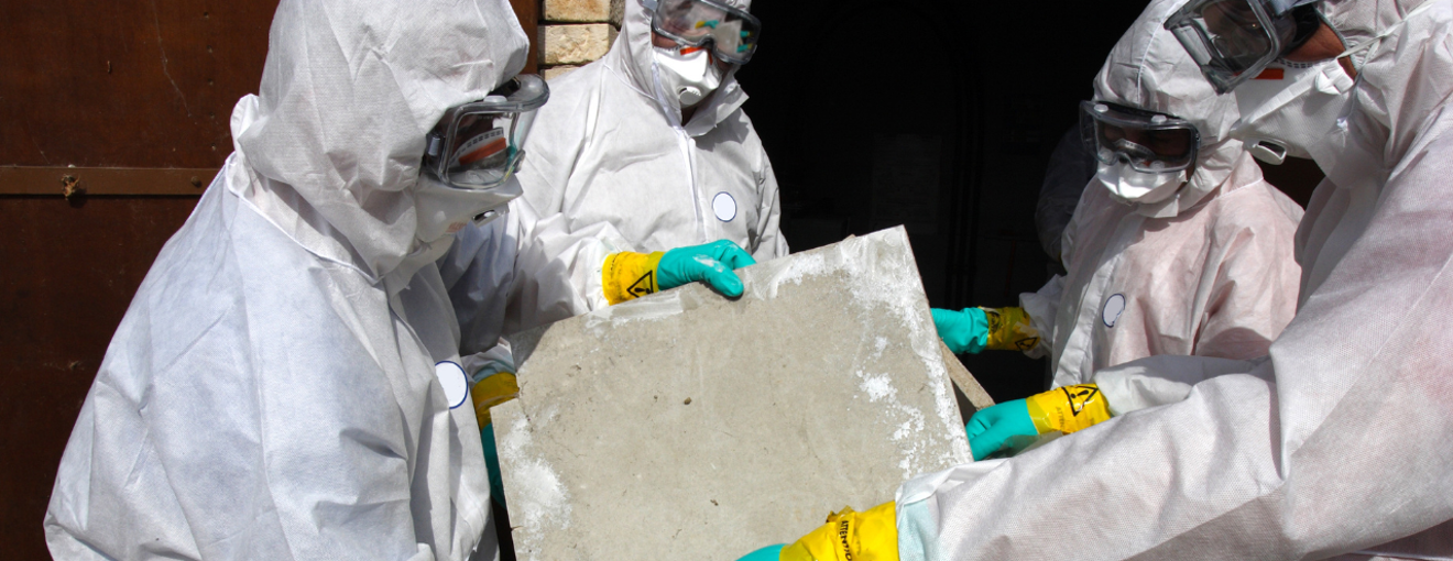 A group of people in PPE 