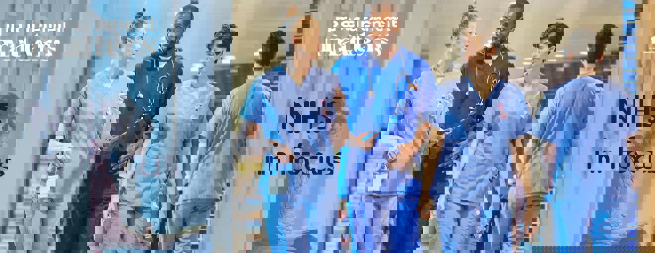 Healthcare staff walking through a hospital corridor wearing medical scrubs